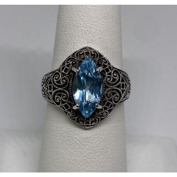 925 STERLING SILVER WITH BLUE TOPAZ  RING  SIZE- 6.75 - Picture 1 of 7